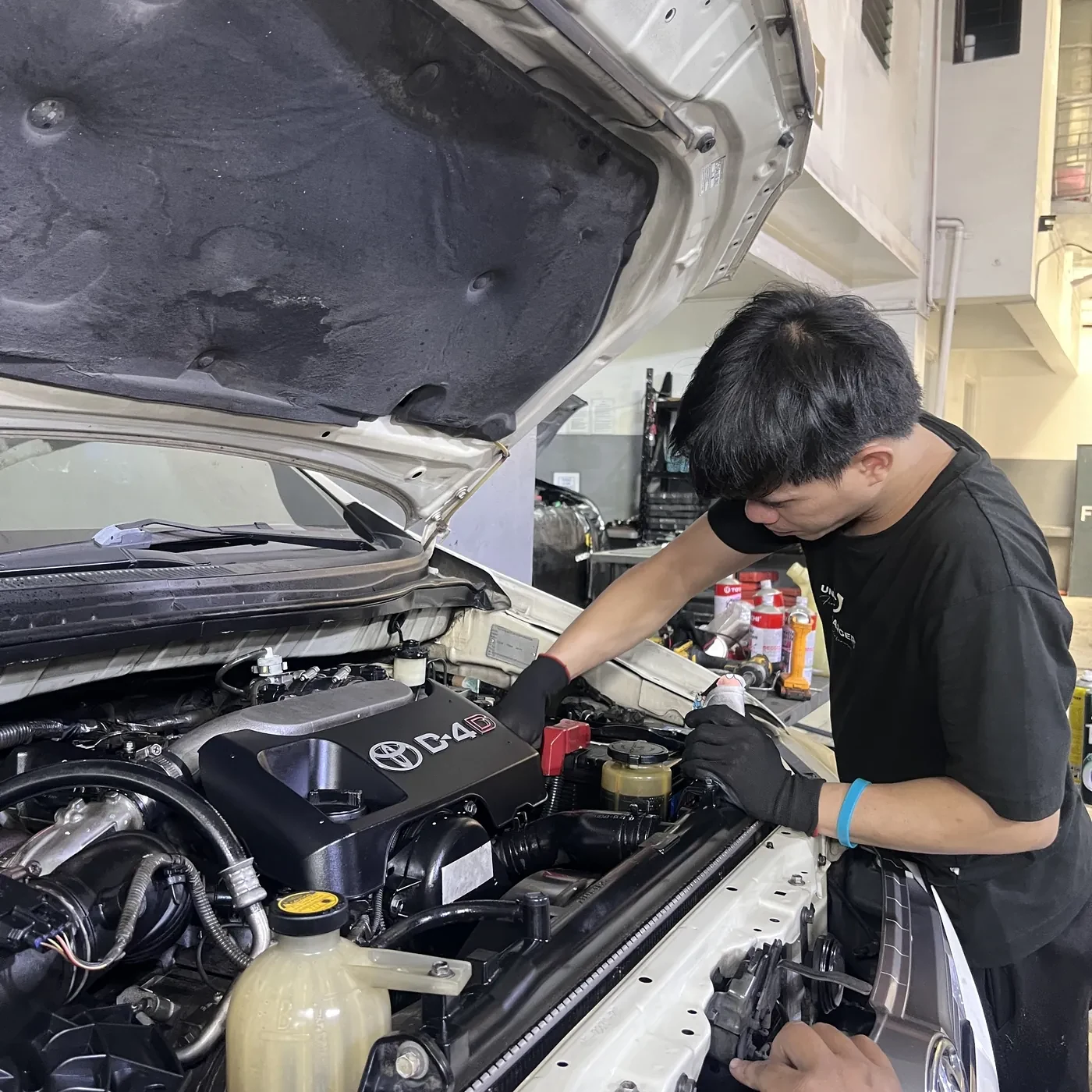 Underchargers engine bay inspection for EGR related service